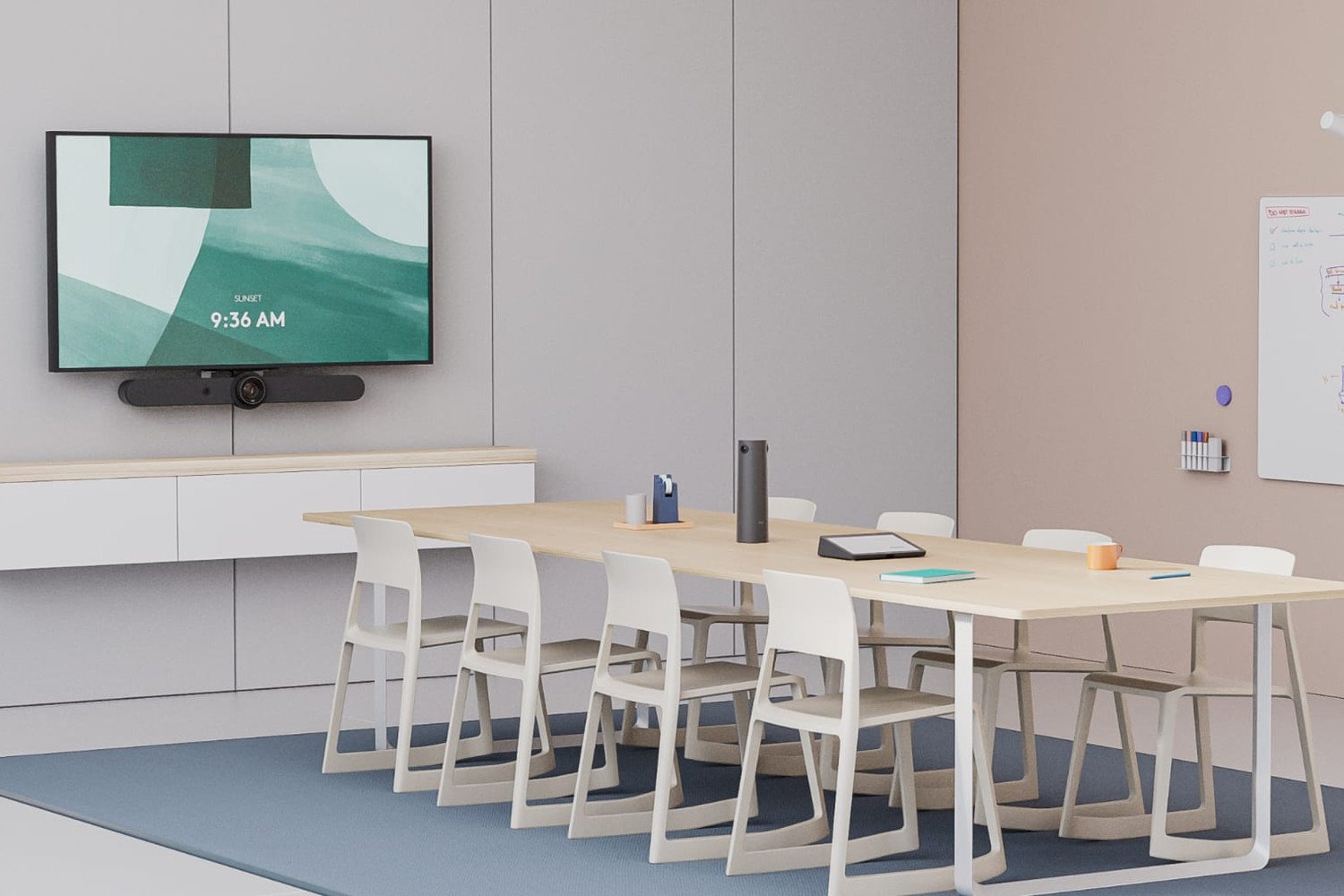 A Logitech-equipped meeting room with wall-mounted video bar and display